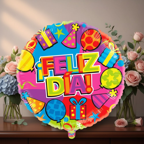 Globo redondo de colores brillantes con texto ¡Feliz día! y dibujos de regalos, globos y sombreros de fiesta, frente a un jarrón con ramos de flores sobre una mesa de madera